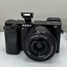 Sony Alpha a6000 24.3MP Mirrorless Digital Camera w/ 16-50mm OSS Lens English